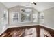 Bright sunroom featuring hardwood floors and multiple windows at 2071 Imperial Pond, Powder Springs, GA 30127