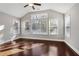 Bright sunroom featuring hardwood floors and multiple windows at 2071 Imperial Pond, Powder Springs, GA 30127