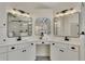 Modern bathroom with double vanity and large mirrors at 3405 Doral Ln, Woodstock, GA 30189