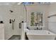 Spa-like bathroom with a large shower and soaking tub at 3405 Doral Ln, Woodstock, GA 30189