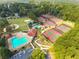 Aerial view of community pool, tennis courts at 3405 Doral Ln, Woodstock, GA 30189