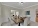 Bright dining room with hardwood floors and a view to the Gathering room at 3405 Doral Ln, Woodstock, GA 30189