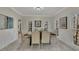 Formal dining room with wood table and plenty of natural light at 3405 Doral Ln, Woodstock, GA 30189