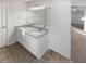 Bathroom with double vanity, granite countertop, and neutral flooring at 169 Hunters, Mcdonough, GA 30253