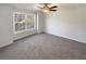 Spacious bedroom with large window and neutral wall color at 169 Hunters, Mcdonough, GA 30253