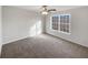 Bright bedroom featuring neutral walls and plush carpeting at 169 Hunters, Mcdonough, GA 30253