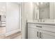 Updated bathroom with white vanity and quartz countertop at 275 Shaded Oaks Se Ln, Marietta, GA 30067