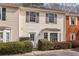 Updated 2-story townhome with neutral siding and landscaping at 275 Shaded Oaks Se Ln, Marietta, GA 30067