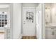 Modern powder room with white vanity and quartz countertop at 275 Shaded Oaks Se Ln, Marietta, GA 30067