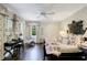 bedroom with antique bed, patterned wallpaper, and a charming sitting area at 3382 Habersham Nw Rd, Atlanta, GA 30305