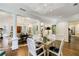 Formal dining room with hardwood floors and view to living room at 3382 Habersham Rd, Atlanta, GA 30305