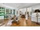 Bright dining room with green built-ins and hardwood floors at 3382 Habersham Rd, Atlanta, GA 30305