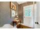 Charming hallway with patterned wallpaper and wooden floors at 3382 Habersham Nw Rd, Atlanta, GA 30305