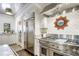 Modern kitchen with stainless steel appliances and white cabinetry at 3382 Habersham Nw Rd, Atlanta, GA 30305