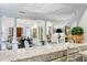 Kitchen with granite countertop and view into living room at 3382 Habersham Rd, Atlanta, GA 30305