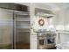 High-end kitchen, stainless steel appliances, white cabinets at 3382 Habersham Nw Rd, Atlanta, GA 30305