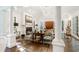 Living room with hardwood floors, fireplace, and high ceilings at 3382 Habersham Nw Rd, Atlanta, GA 30305