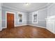 Bright living room featuring hardwood floors and neutral wall colors at 135 Adair Se Ave, Atlanta, GA 30315