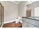 Bathroom with a walk-in shower, granite countertop, and neutral color scheme at 3505 Watson Rd, Cumming, GA 30028