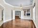 Spacious main bedroom featuring hardwood floors, neutral paint, and plenty of natural light at 3505 Watson Rd, Cumming, GA 30028