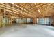 Unfinished basement providing a blank canvas for customization and expansion with exposed ceiling at 3505 Watson Rd, Cumming, GA 30028