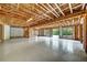 Unfinished basement providing a blank canvas for customization and expansion with door and windows at 3505 Watson Rd, Cumming, GA 30028