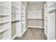 Spacious walk-in closet with custom shelving and ample storage space, perfect for organization at 3505 Watson Rd, Cumming, GA 30028