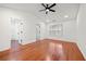 Large main bedroom with hardwood floors and walk-in closet at 438 Lantern Wood Dr, Scottdale, GA 30079