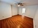 This bedroom has stylish flooring, fresh white walls, and abundant natural light at 701 Cameron M Alexander Nw Blvd, Atlanta, GA 30318