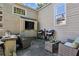 Cozy backyard patio with an outdoor TV, stone bar, and comfortable seating, ideal for relaxation at 250 Lakeview Ne Ave, Atlanta, GA 30305