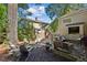 Backyard patio featuring a fire pit and comfortable seating for outdoor entertaining and relaxation at 250 Lakeview Ne Ave, Atlanta, GA 30305