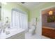 Well-lit bathroom featuring a white vanity at 250 Lakeview Ne Ave, Atlanta, GA 30305