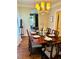 Formal dining room boasts wood floors, decorative chandelier, and seating for eight at 250 Lakeview Ne Ave, Atlanta, GA 30305