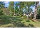 Beautiful landscaped front yard featuring a well-maintained lawn and mature trees at 250 Lakeview Ne Ave, Atlanta, GA 30305
