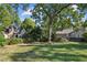 A large tree and grassy yard highlights the exterior of this beautiful home at 250 Lakeview Ne Ave, Atlanta, GA 30305
