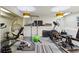 Home gym featuring exercise equipment, weights, and hanging chair at 250 Lakeview Ne Ave, Atlanta, GA 30305