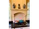 Kitchen features granite counters, gas range, tile backsplash, and vintage decor at 250 Lakeview Ne Ave, Atlanta, GA 30305