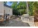 Outdoor kitchen featuring a built-in grill and counter space and stone patio, great for summer barbecues at 250 Lakeview Ne Ave, Atlanta, GA 30305