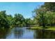 Scenic pond view surrounded by lush greenery and trees, offering a tranquil and serene environment at 250 Lakeview Ne Ave, Atlanta, GA 30305