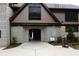 Dan Martin Pool House exterior, featuring stone and siding, with an inviting entrance at 250 Lakeview Ne Ave, Atlanta, GA 30305