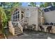 Charming screened porch and stone patio with access to the house, perfect for relaxing outdoors at 250 Lakeview Ne Ave, Atlanta, GA 30305