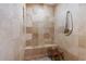 A tiled shower featuring a built-in bench at 250 Lakeview Ne Ave, Atlanta, GA 30305