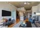 Spacious living room with hardwood floors, open kitchen, and city views at 44 Peachtree Ne Pl # 1622, Atlanta, GA 30309