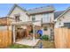 Fenced backyard with patio and covered structure at 145 Gentle Breeze Ct, Temple, GA 30179