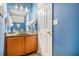 Bathroom with granite countertop and wood cabinets at 145 Gentle Breeze Ct, Temple, GA 30179