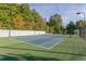 Community tennis court with surrounding trees at 145 Gentle Breeze Ct, Temple, GA 30179