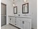 Modern bathroom with double vanity and gray tile floors at 509 Burton Dr # 806, Alpharetta, GA 30009