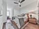 Cozy bedroom featuring a wooden bed frame and hardwood floors at 509 Burton Dr # 806, Alpharetta, GA 30009
