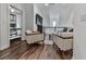Bright hallway with hardwood floors and access to living area at 509 Burton Dr # 806, Alpharetta, GA 30009
