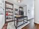 Stylish home office with built-in shelving and hardwood floors at 509 Burton Dr # 806, Alpharetta, GA 30009